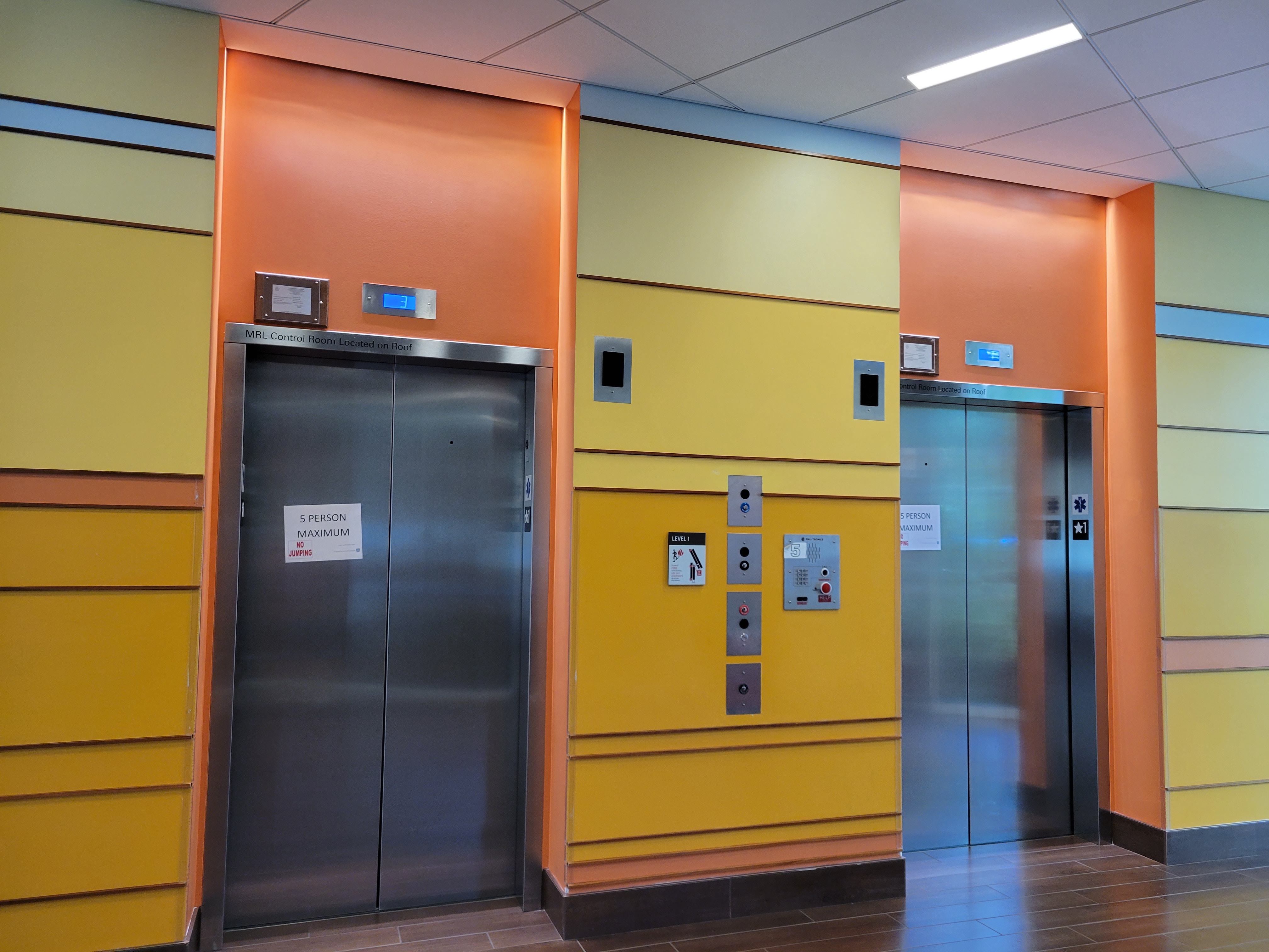 The two University Hall elevators used to transport students to and from the main lobby have been mired in mechanical problems, particularly the one to the left. The elevators are now seen sporting signs indicating that a maximum of five people can use the elevator at any one time.