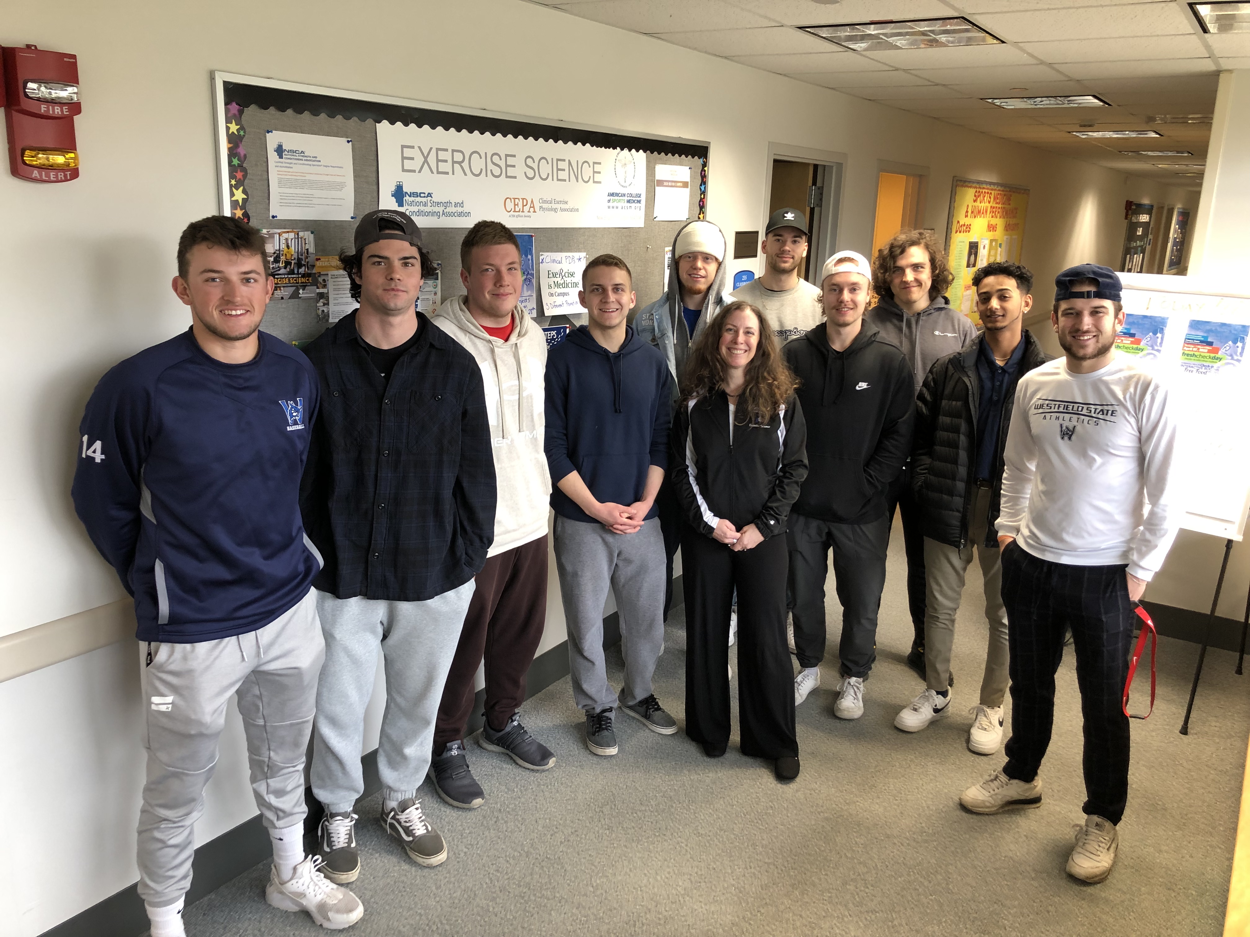 Melissa Roti, professor and director of the Exercise Science Program in the department of Sports Medicine & Human Performance with students to celebrate Westfield State’s silver-level designation from the group ‘Exercise is Medicine’