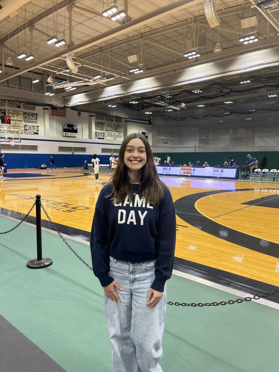 Jordan Sutter at a men's basketball game at Woodward Center.