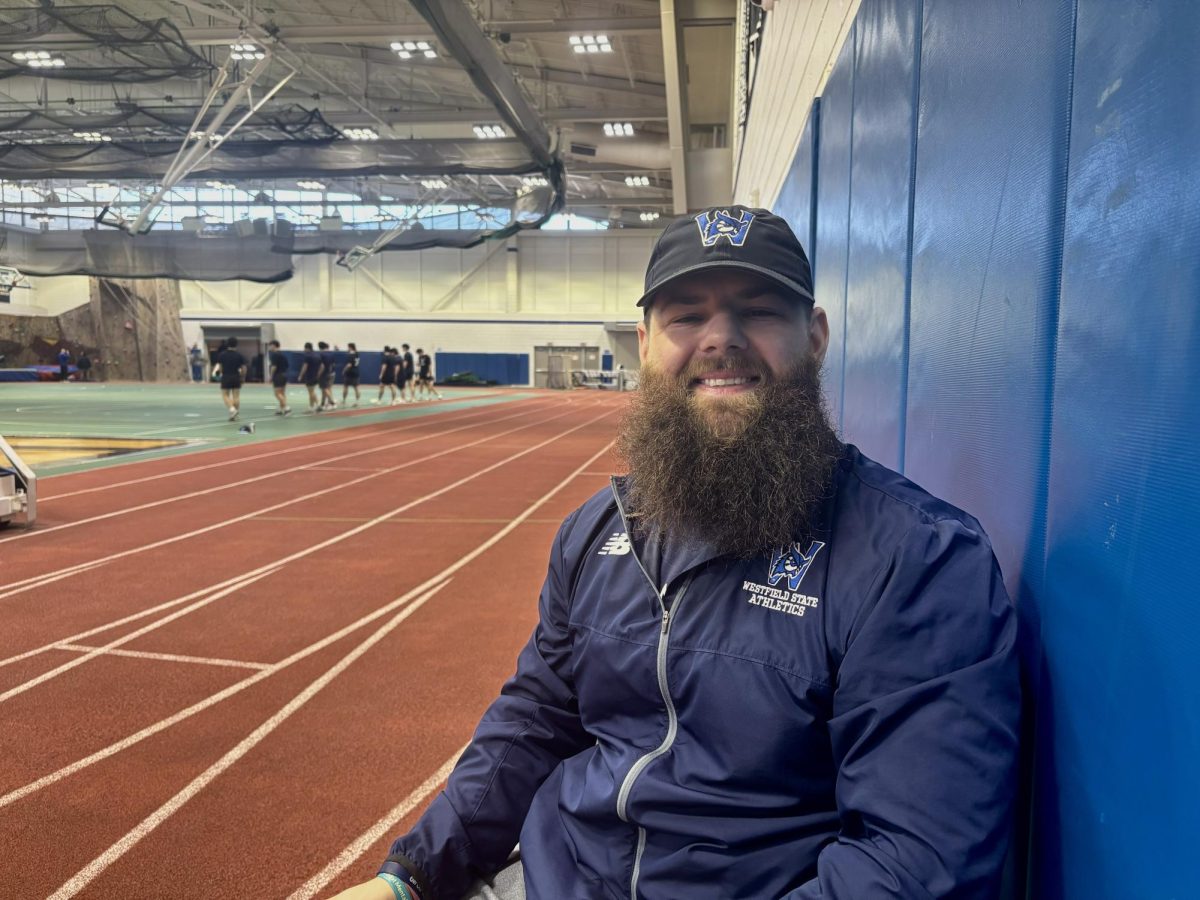 Tucker Bachand in the Field House at Westfield State University, alongside one of his teams 
warming up for lift.